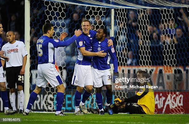 Darius Vassell of Leicester celebrates scoring to make it 2-1 with team mates Michael Morrison and Bruno Berner during the npower Championship match...