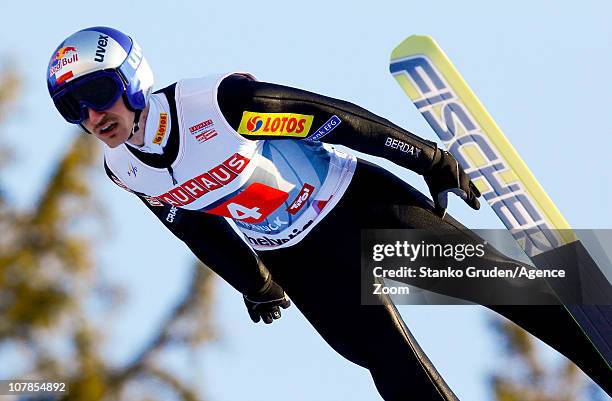 Adam Malysz of Poland takes 2nd place during the FIS Ski Jumping World Cup Vierschanzentournee on January 3, 2011 in Innsbruck, Austria.