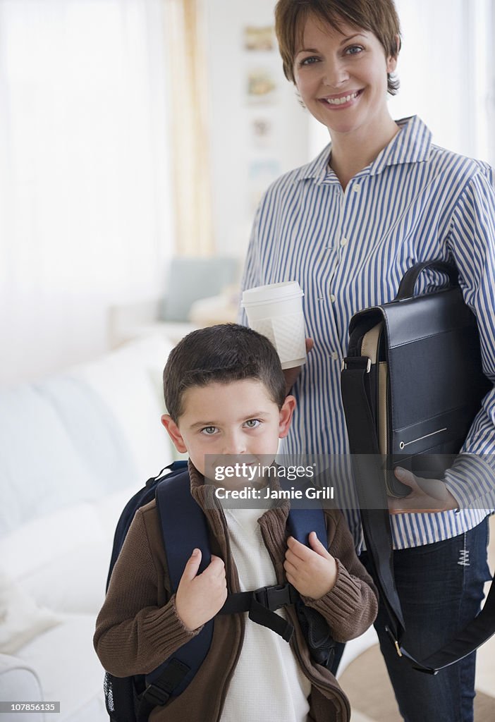 Mother and son ready for work and school