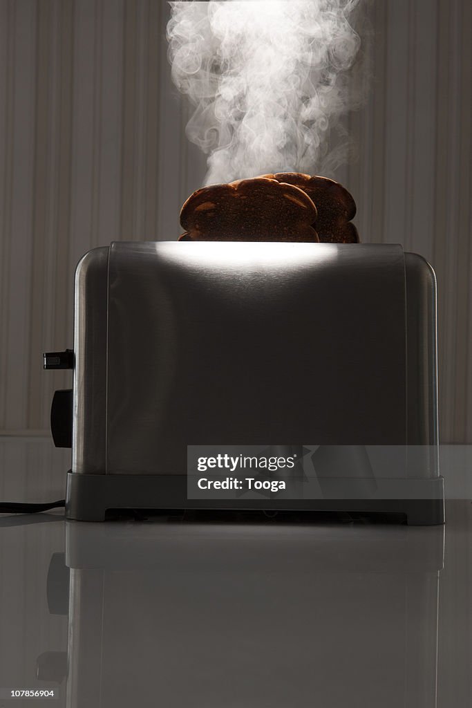 Dramatic Burning Toast In Toaster High-Res Stock Photo - Getty Images