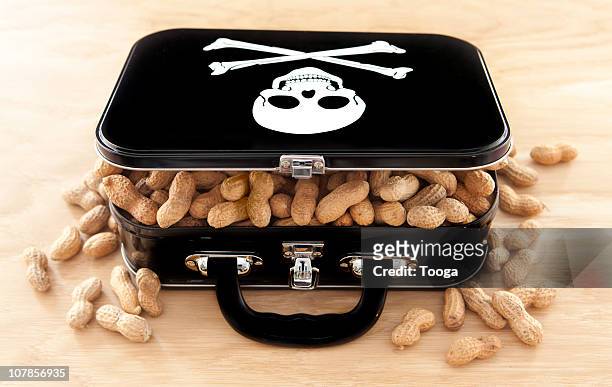 black lunchbox filled with peanuts - food allergy stock pictures, royalty-free photos & images