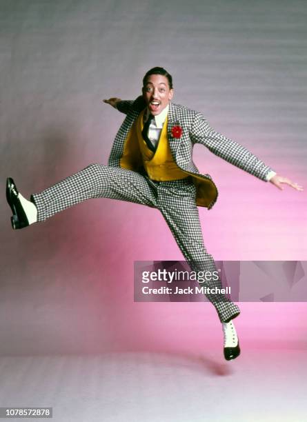 American dancer, actor, singer, and choreographer Gregory Hines in costume for his starring role in 'Sophisticated Ladies' on Broadway, studio photo...