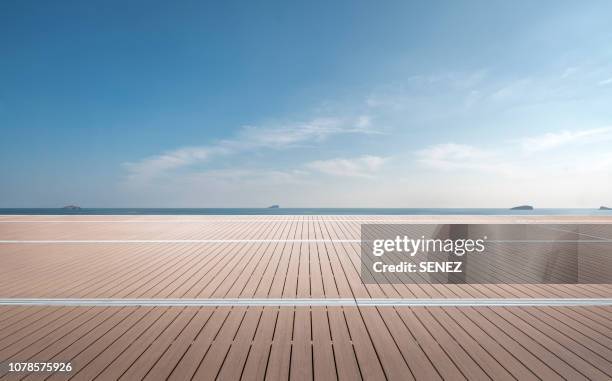 yachts docked in harbor，the city wharf - tall foto e immagini stock