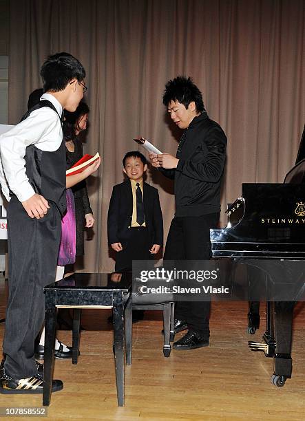 Pianist Lang Lang and his Foundation Scholars Derek Wang, Anna Larsen and Charlie Liu attend the VH1 Save the Music Foundation Grant Recipient...