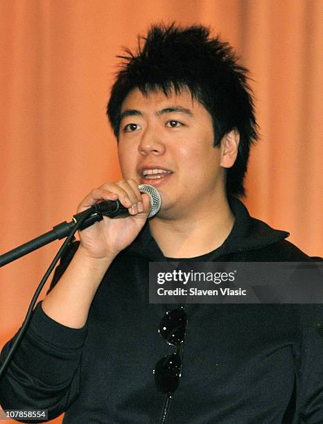 Pianist Lang Lang performs at the VH1 Save the Music Foundation Grant Recipient School, PS 334 - The Anderson School on January 3, 2011 in New York...