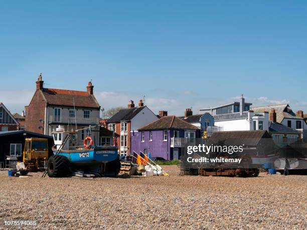 tractors and fishing boats on the beach at aldeburgh, suffolk - aldeburgh stock pictures, royalty-free photos & images