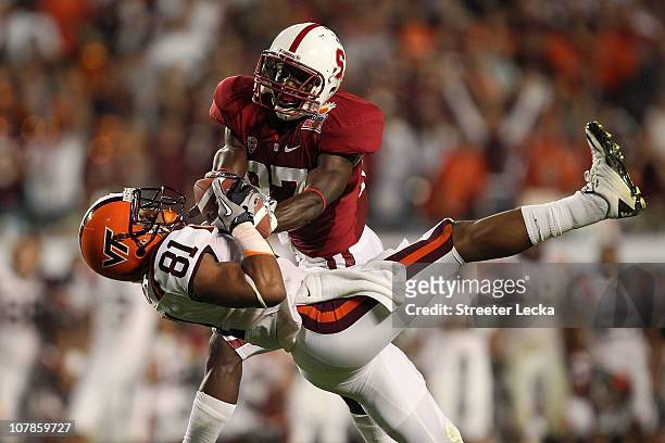 Jarrett Boykin of the Virginia Tech Hokies makes a recption in the seocnd quarter against Johnson Bademosi of the Stanford Cardinal during the 2011...