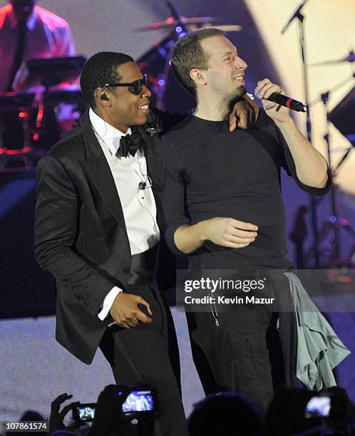 Rapper Jay-Z and musician Chris Martin of the band Coldplay perform onstage at The Cosmopolitan Grand Opening and New Year's Eve Celebration with...
