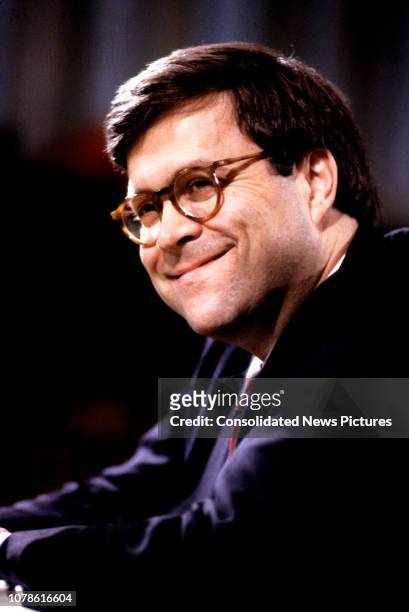 United States Deputy Attorney General William P Barr smiles as he testifies before the US Senate Committee on the Judiciary during his confirmation...