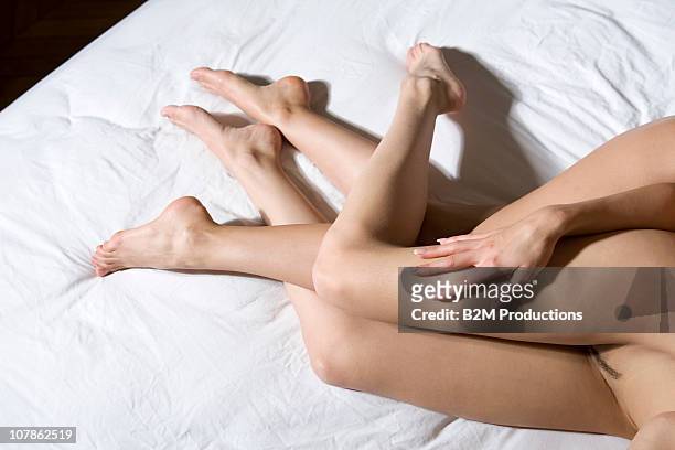 female homosexual couple doing sexual activity - pubic hair young women stock pictures, royalty-free photos & images