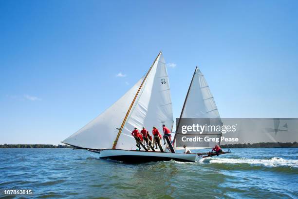 log canoe sailing regatta - sailing regatta stock pictures, royalty-free photos & images