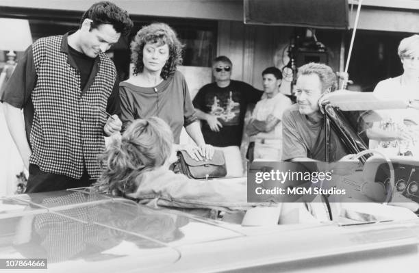 Actor Michael Madsen , actresses Susan Sarandon and Geena Davis, and director Ridley Scott on the set of the film 'Thelma And Louise', 1991.