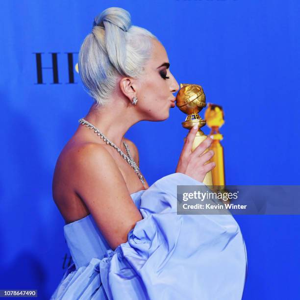 Winner for Best Original Song - Motion Picture for 'Shallow - A Star is Born' Lady Gaga poses with the trophy in the press room during the 76th...
