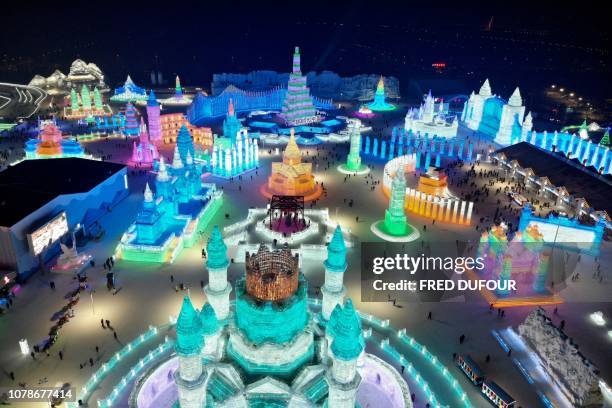 An aerial view shows ice sculptures during the annual Harbin Ice and Snow Festival in Harbin, in China's northeast Heilongjiang province on January...