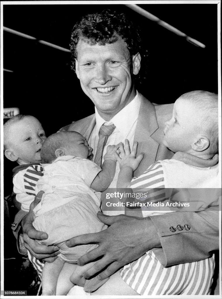 Ray Borner - Baskeballer from the Australian Olympic team with his three children twins Jaret and Jacob and baby in the middle 6 weeks old Samuel.