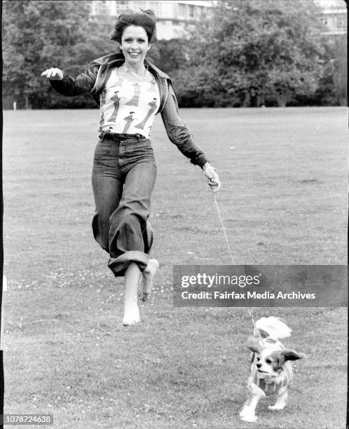 Sydney actress Kate Ferguson of Paddington frolics with her 3 years old Cavalier King Charles Spaniel "Chloe". When she took her for a walk in...