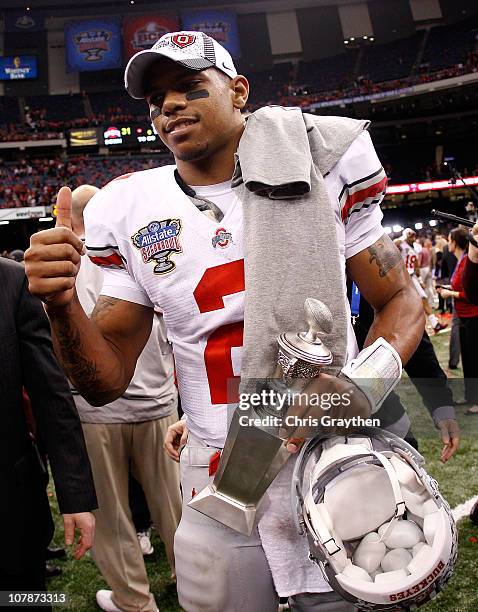 Quarterback Terrelle Pryor of the Ohio State Buckeyes celebrates the Buckeyes 31-26 victory against the Arkansas Razorbacks during the Allstate Sugar...