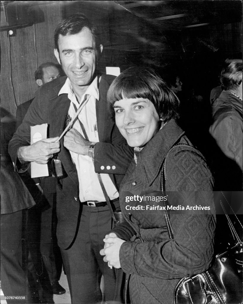 Professor and Mrs. Ehrlich arrive from the U.S. (he has cameras etc. strung around his neck .. for identification).Portraits of Mrs. Ehrlich.The portrait and perhaps the two some picture are for Herald Social Michael Symonds is doing a few pars for social