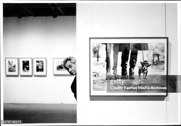 Photojournalist Elliot Erwitt with his most famous image of dogs for his exhibition titled "To The Dogs".Elliott Erwitt's dog obsession started half...