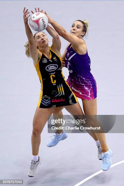 Jade Clarke of Wasps battles for the ball with Loughborough's Natalie Panagarry during the match between Wasps and Loughborough Lightning during the...