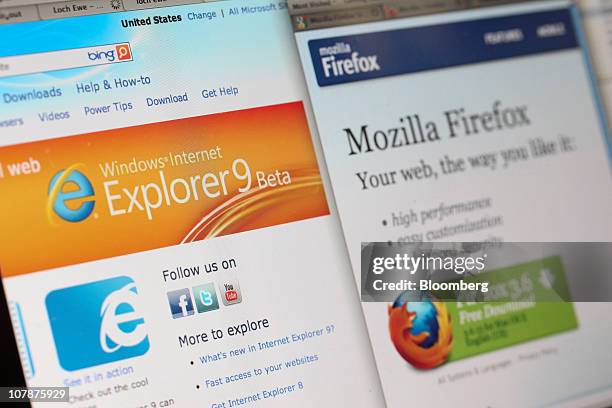 Microsoft Corp.'s Windows Internet Explorer logo, left, is displayed next to the Mozilla Corp.'s Firefox web browser on a computer monitor in London,...