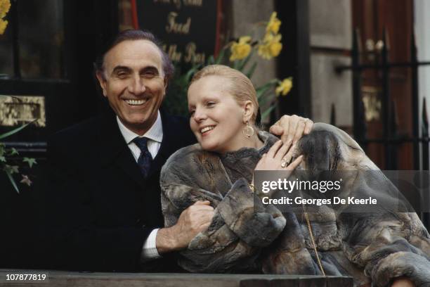 Italian television presenter Pippo Baudo with his wife, Italian soprano Katia Ricciarelli, London, 27th March 1989.