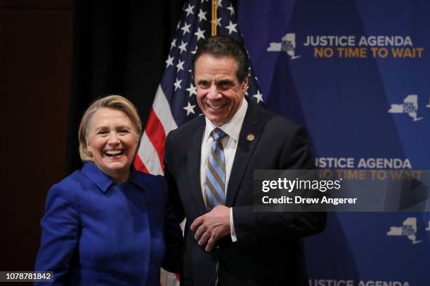 Former Secretary of State Hillary Clinton and New York Governor Andrew Cuomo smile at the end of an event to discuss reproductive rights at Barnard...