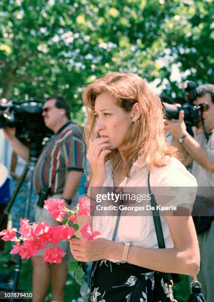 Fans bring tributes to the Miami Beach home of Italian fashion designer Gianni Versace, shortly after his murder, Florida, 15th July 1997.