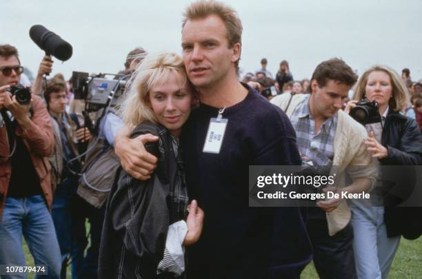 English musician and singer Sting and his wife Trudie Styler take part in Sport Aid in London, 25th May 1986. Sport Aid raised money for famine...