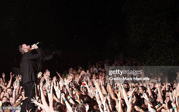 Matt Berninger of The National sings from the crowd during the 2011 Sunset Sounds music festival at the Brisbane Botanical Gardens and River Stage on...