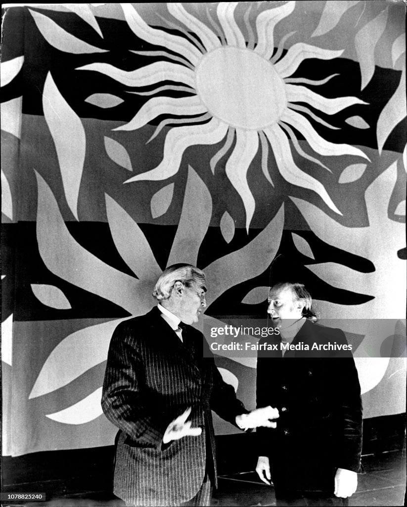 The curtain hanging from the Rehearsal/recording studio ceiling, where it remain until taken to the Opera Theatre ready for the opening.  The Minister for Public Works Mr. Davis Hughes talking with the designer Mr. John Coburn.  Two unique stage curtains
