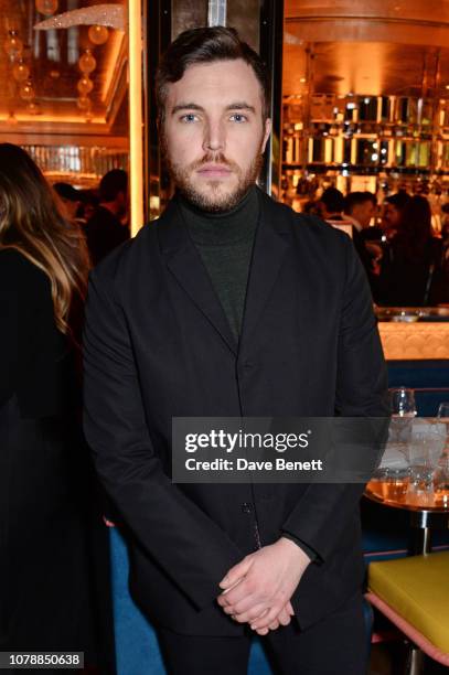 Tom Hughes attends the GQ dinner hosted by Dylan Jones and David Beckham to celebrate London Fashion Week Men's January 2019 at Brasserie Of Light in...