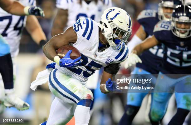 Marlon Mack of the Indianapolis Colts runs with the ball against the Tennessee Titans at Nissan Stadium on December 30, 2018 in Nashville, Tennessee.