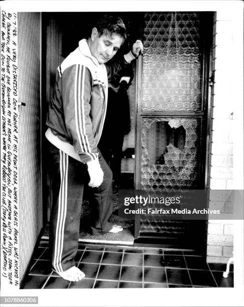 Very distressed Don Furner at his front door, where a glass panel was kicked in by gunmen, he fought one gunman at his HDME in Queanbeyan, but...