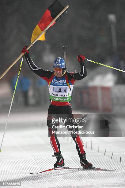 Michael Greis of Germany celebrates the victory in the men's relay during the e.on IBU Biathlon World Cup on January 05, 2011 in Oberhof, Germany.