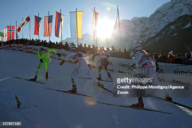 Petra Majdic of Slovenia, Anna Haag of Sweden and Maria Rydqvist of Sweden compete during the individual sprint women for the FIS Cross Country World...