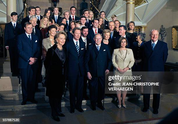 Participants pose for the family photo for the 90th anniversary of Grand-Duc Jean, on January 5, 2011 at the Grand Ducale Palace in Luxembourg.From L...