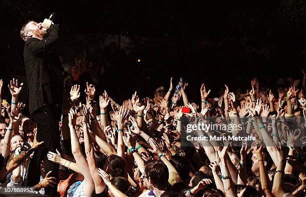 Matt Berninger of The National sings from the crowd during the 2011 Sunset Sounds music festival at the Brisbane Botanical Gardens and River Stage on...