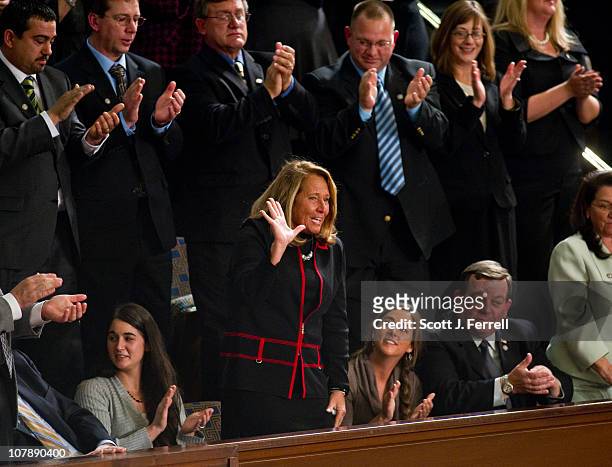 Jan. 05: Surrounded by family and friends, Debbie Boehner waves as outgoing House Speaker Nancy Pelosi, D-Calif., recognizes her before handing the...