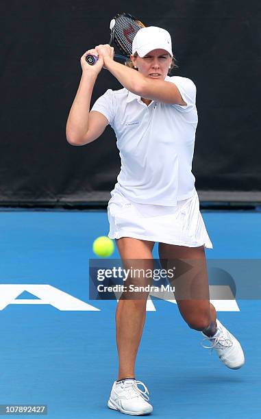 Greta Arn of Hungary plays a backhand during her match against Maria Sharapova of Russia during day four of the ASB Classic at ASB Tennis Centre on...