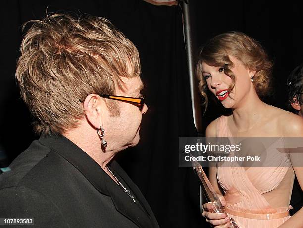 Sir Elton John and singer Taylor Swift pose backstage at the 2011 People's Choice Awards at Nokia Theatre L.A. Live on January 5, 2011 in Los...