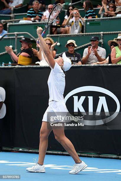 Greta Arn of Hungary celebrates winning her match against Maria Sharapova of Russia during day one of the ASB Classic at ASB Tennis Centre on January...