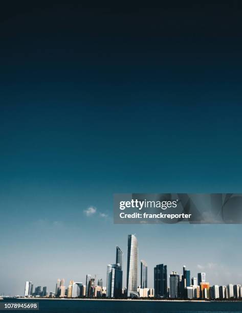 abu dhabi skyline - national landmark stock pictures, royalty-free photos & images