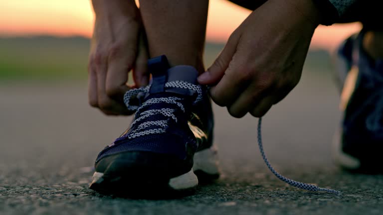 https://media.gettyimages.com/id/1078964184/video/woman-tying-shoelaces-on-running-shoes.jpg?b=1&s=640x640&k=20&c=GgXkBlzewgQAMxcApdiiR3NLNHmhbOBb0_1AzB7-kOk=