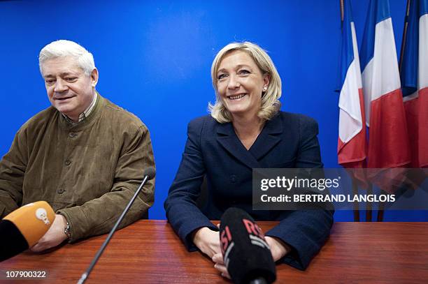 French Front National far-right party's vice-President Marine Le Pen and second vice-President Bruno Gollnisch give a press conference to present...