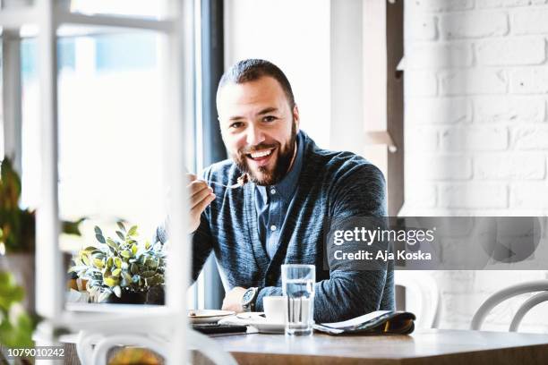 coffee break. - man eating pie stock pictures, royalty-free photos & images