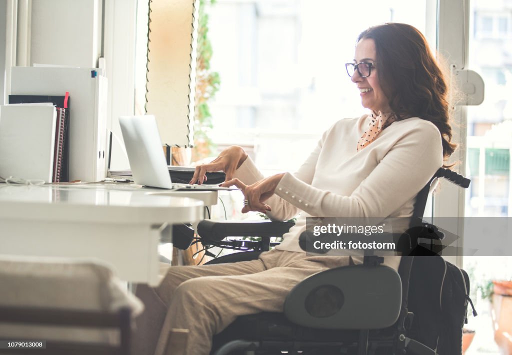 Woman with disability working