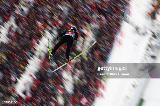 Adam Malysz of Poland competes during trial round for the FIS Ski Jumping World Cup event of the 59th Four Hills ski jumping tournament at...