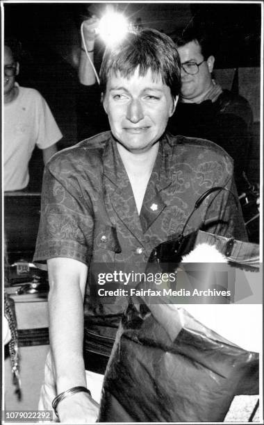 Passengers from the P &amp; O cruise ship, Fairstar on arrival at Mascot Airport.Picture show: The Emotion is etched of the face of Mrs Christine...