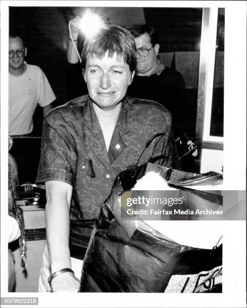 Passengers from the P &amp; O cruise ship, Fairstar on arrival at Mascot Airport.Pic shows: The emotion is etched on the face of Mrs Christine...